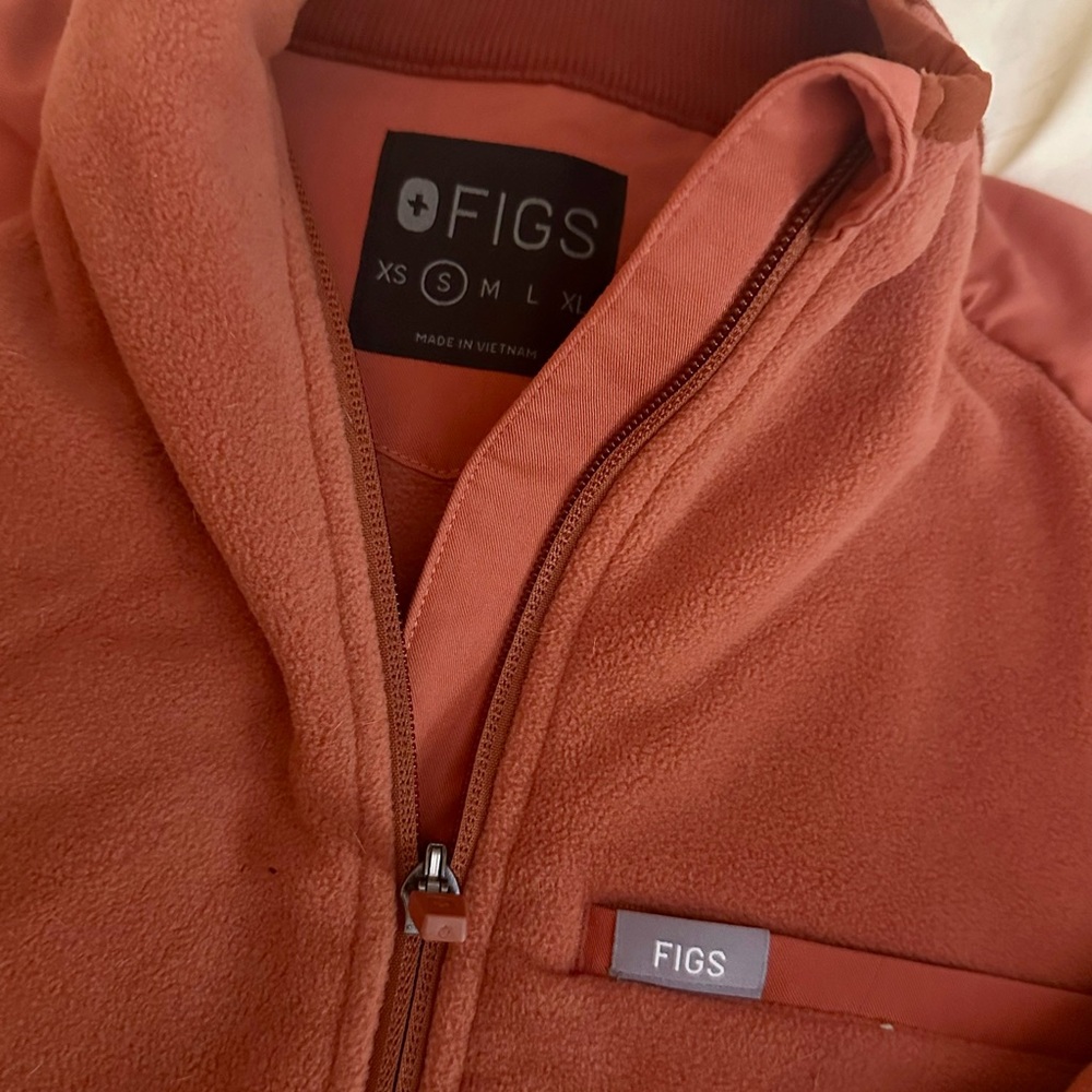 FIGS Rust colored zip up fleece